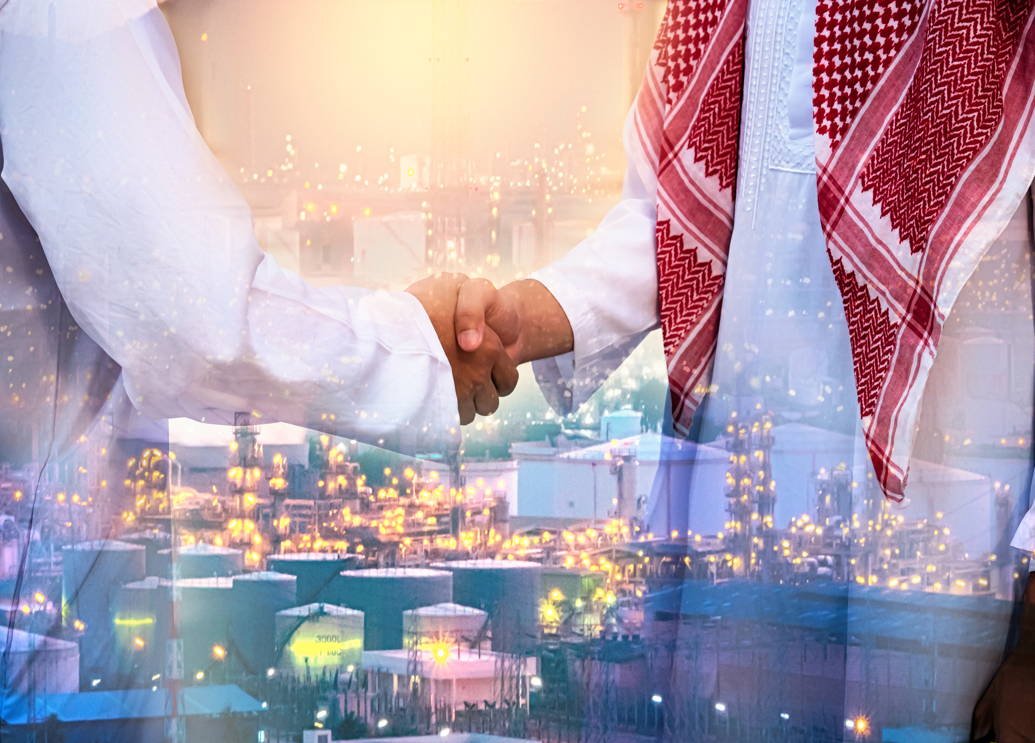 Double exposure of business handsome Arab man hand shake and Oil refinery background